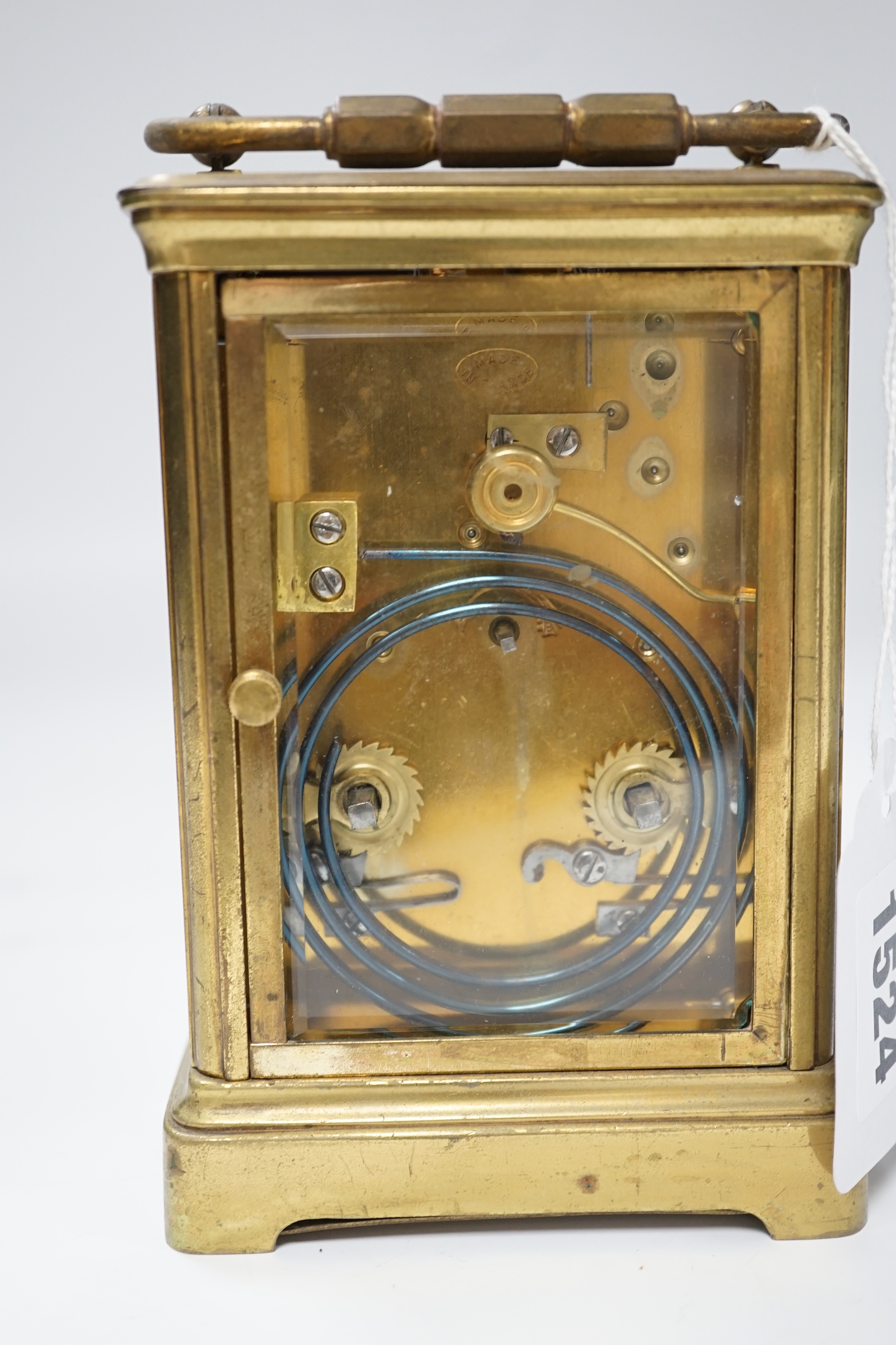 A brass carriage clock, dial signed Bechtler Allahabad, striking on a coiled gong, 13.5cm high